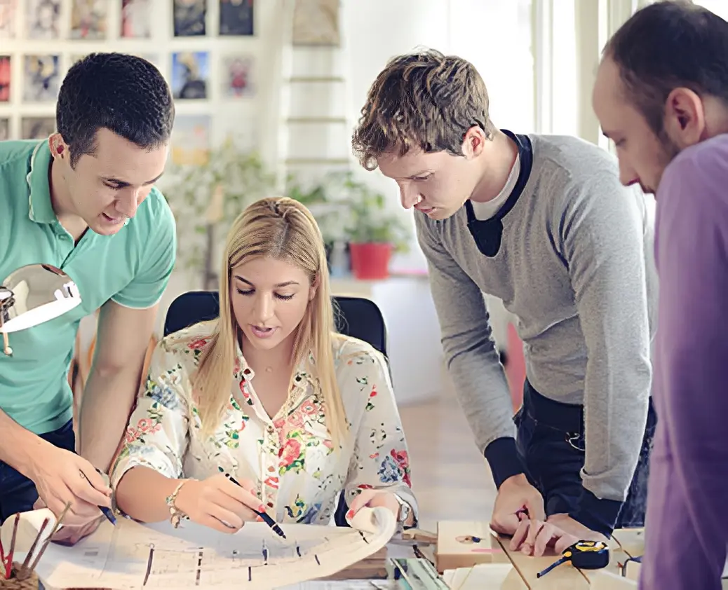 Group reviewing architectural plans